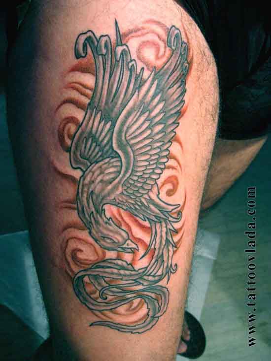 Grey Ink Flying Phoenix Tattoo On Side Leg