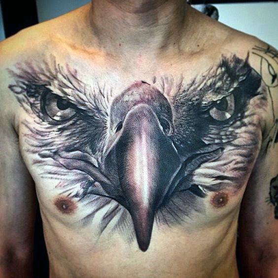 Grey Ink Large Eagle Beak With Eyes Tattooed On Man Chest