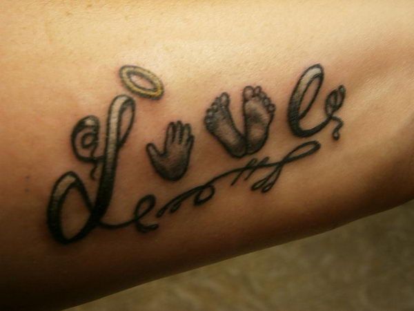 Incredible baby memorial Love tattoo with baby hand and feet