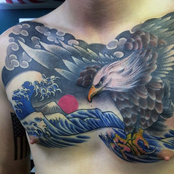 Japanese Eagle Flying Over The Oceans Tattoo On Man Chest