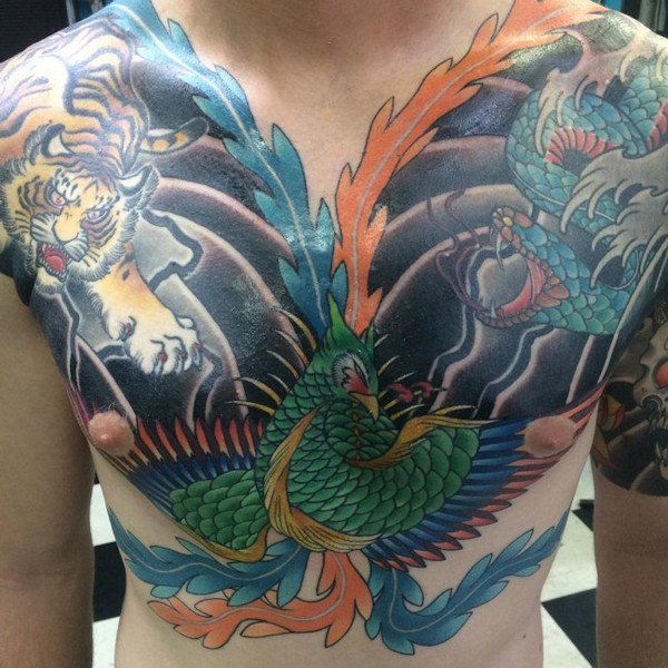 Japanese Tiger And Phoenix Tattoo On Man Chest