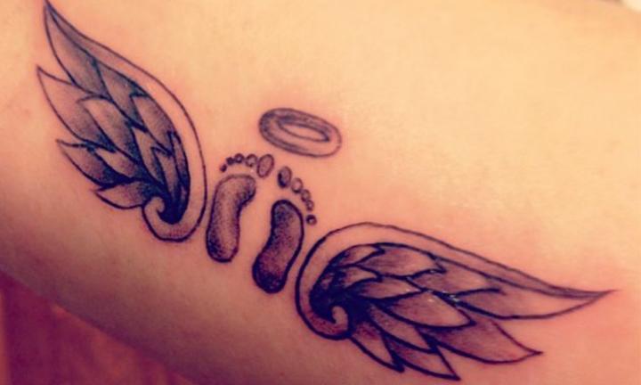 Little baby feet with angel wings and holy halo tattoo