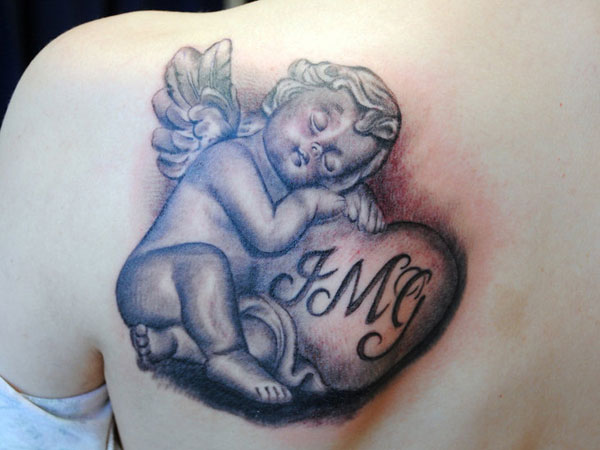 Memorial baby angel tattoo on left back shoulder