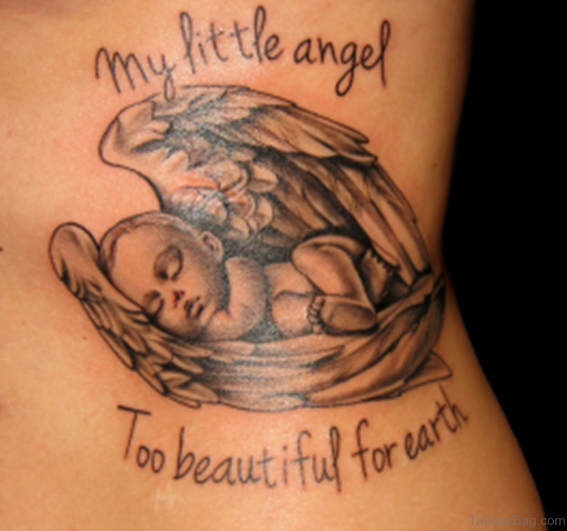 Miscarriage baby tattoo –  A baby sleeping inside wings with wording My little angel. Too beautiful for earth. copy