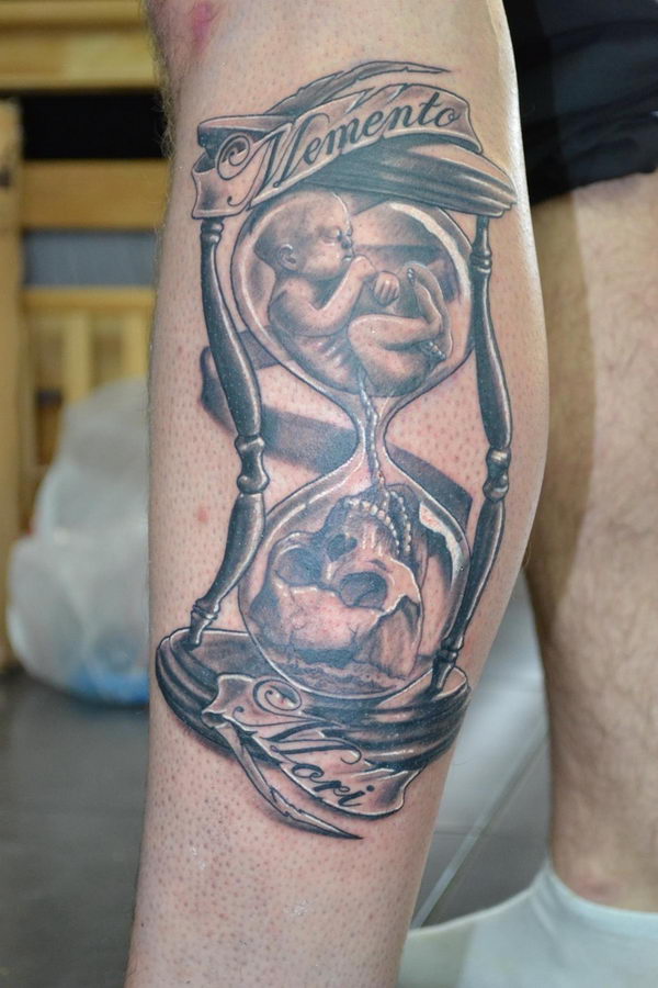 Miscarriage tattoo - Unborn baby and skull on different sides of a hour glass and skull pulling baby to its side