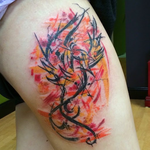Nice Color Ink Abstract Phoenix Tattoo On Side Thigh
