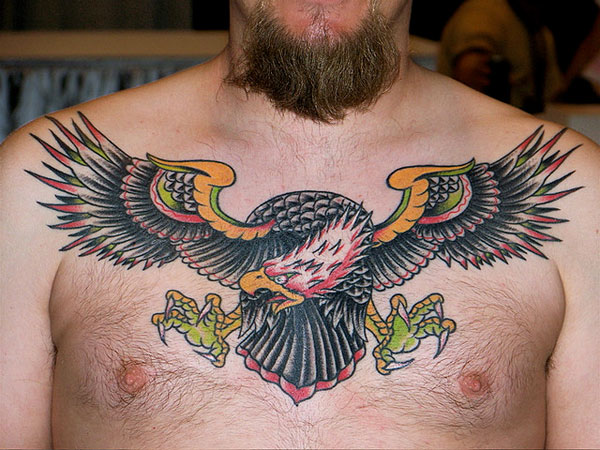 Nice Colorful Flying Eagle Chest Tattoo