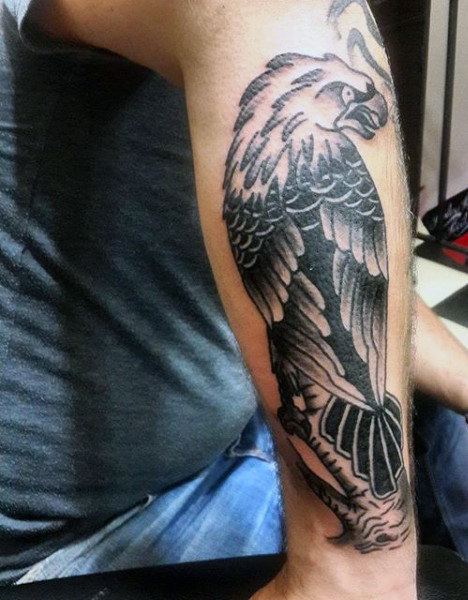 Nice Grey And Black Eagle Tattooed On Forearm