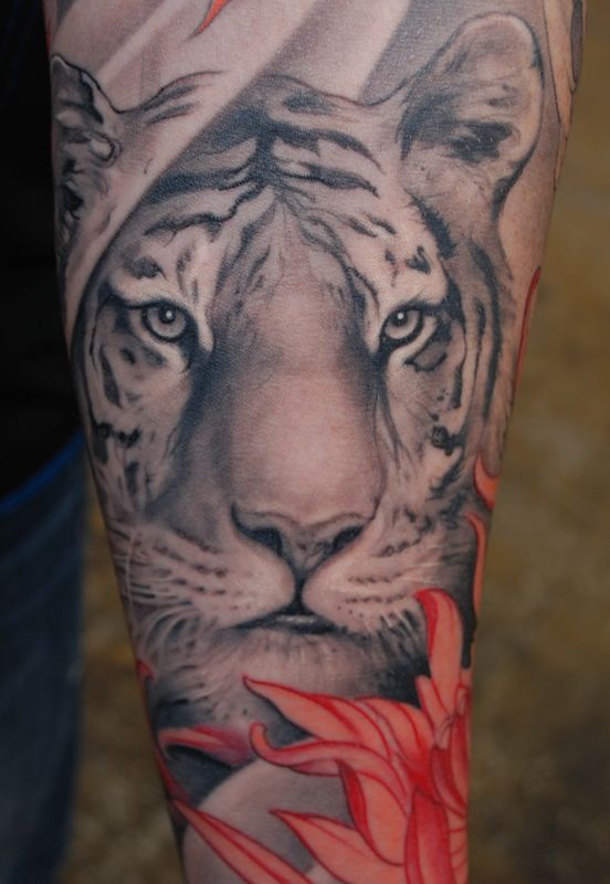 Pink Flower And Tiger Head Tattoo On Left Forearm