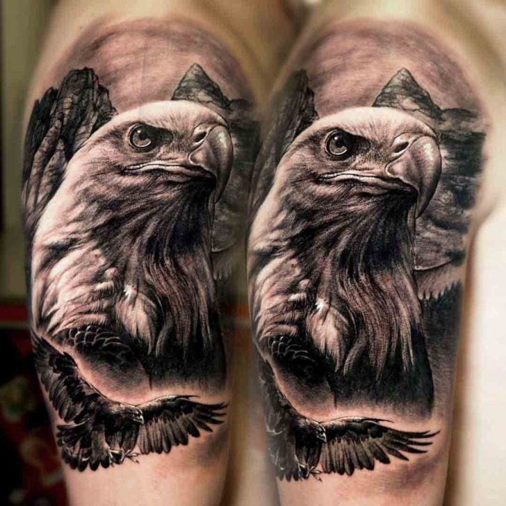 Realistic Grey and Black Eagle Head Tattoo On Shoulder by Remi Francés