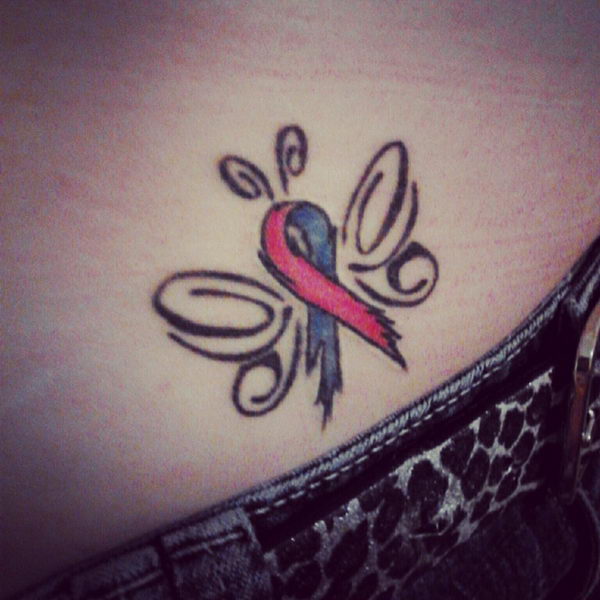 Ribbon butterfly miscarriage tattoo on hip