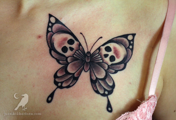 Skulls In Butterfly Wings Tattooed On Front Shoulder