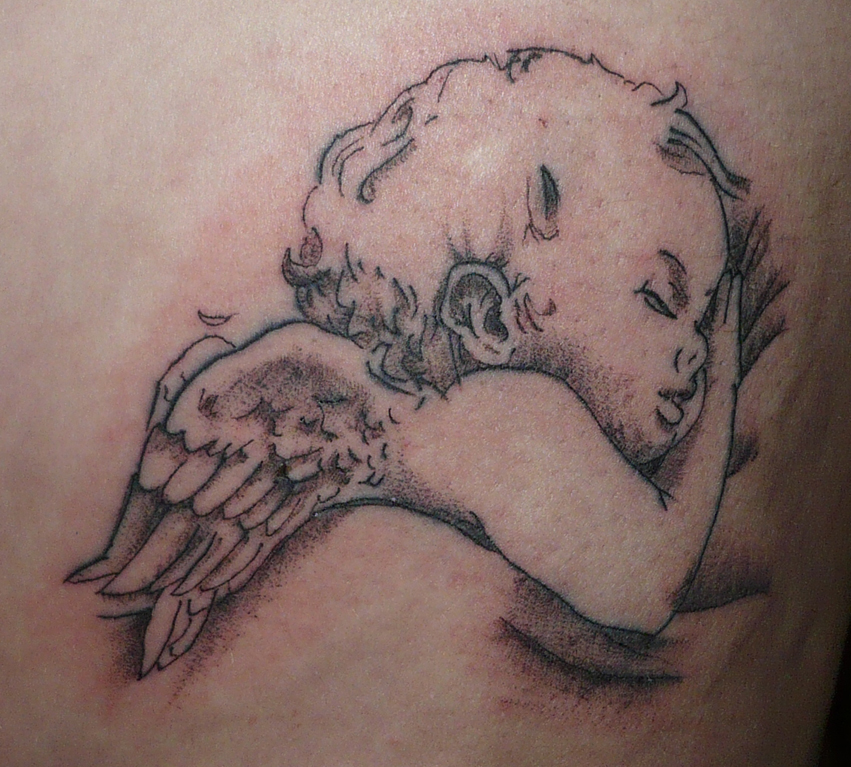 Sleeping baby angel memorial tattoo design