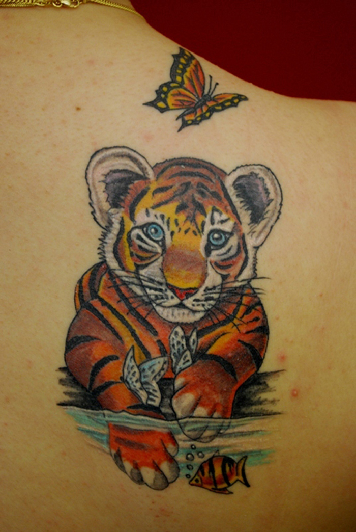Small Butterfly And Tiger Cub Tattoo On Right Back Shoulder