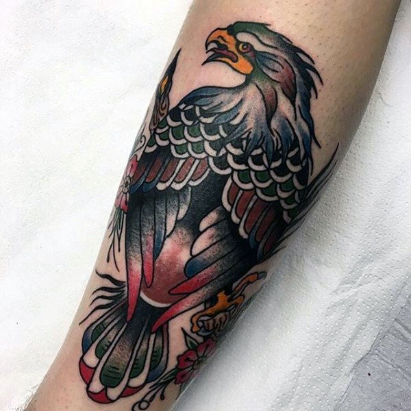 Traditional Eagle Tattoo On Forearm In Black And Red Ink