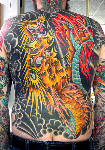Yellow And Red Dragon Tattoo On Man Full Back