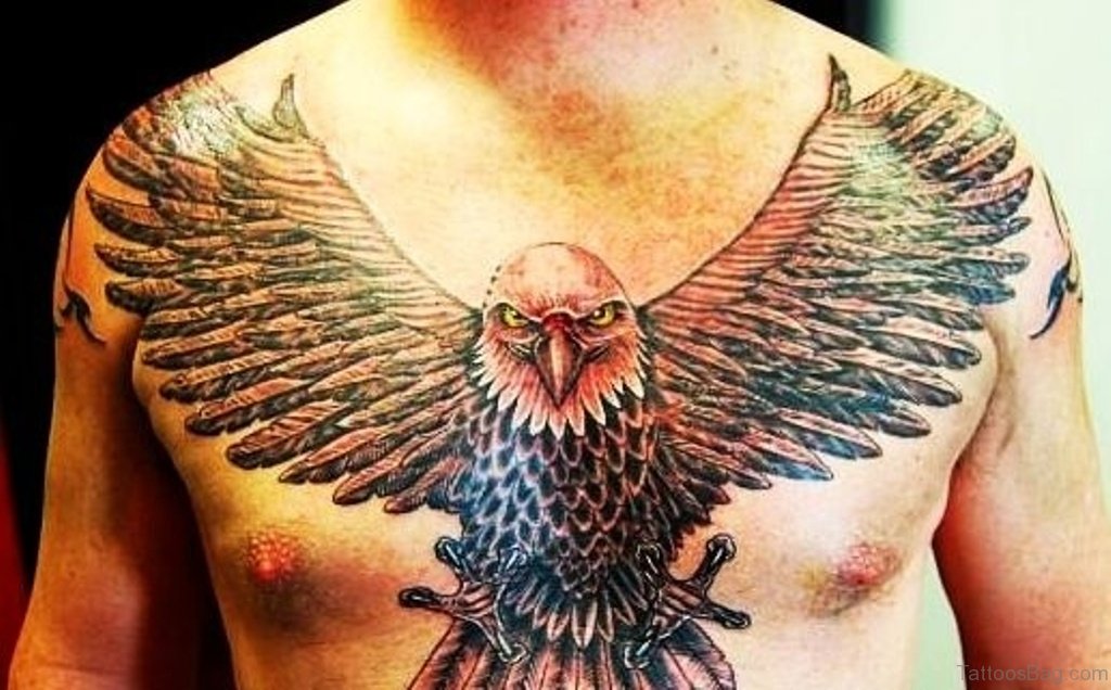 Yellow Eyes Flying Eagle Chest Tattoo