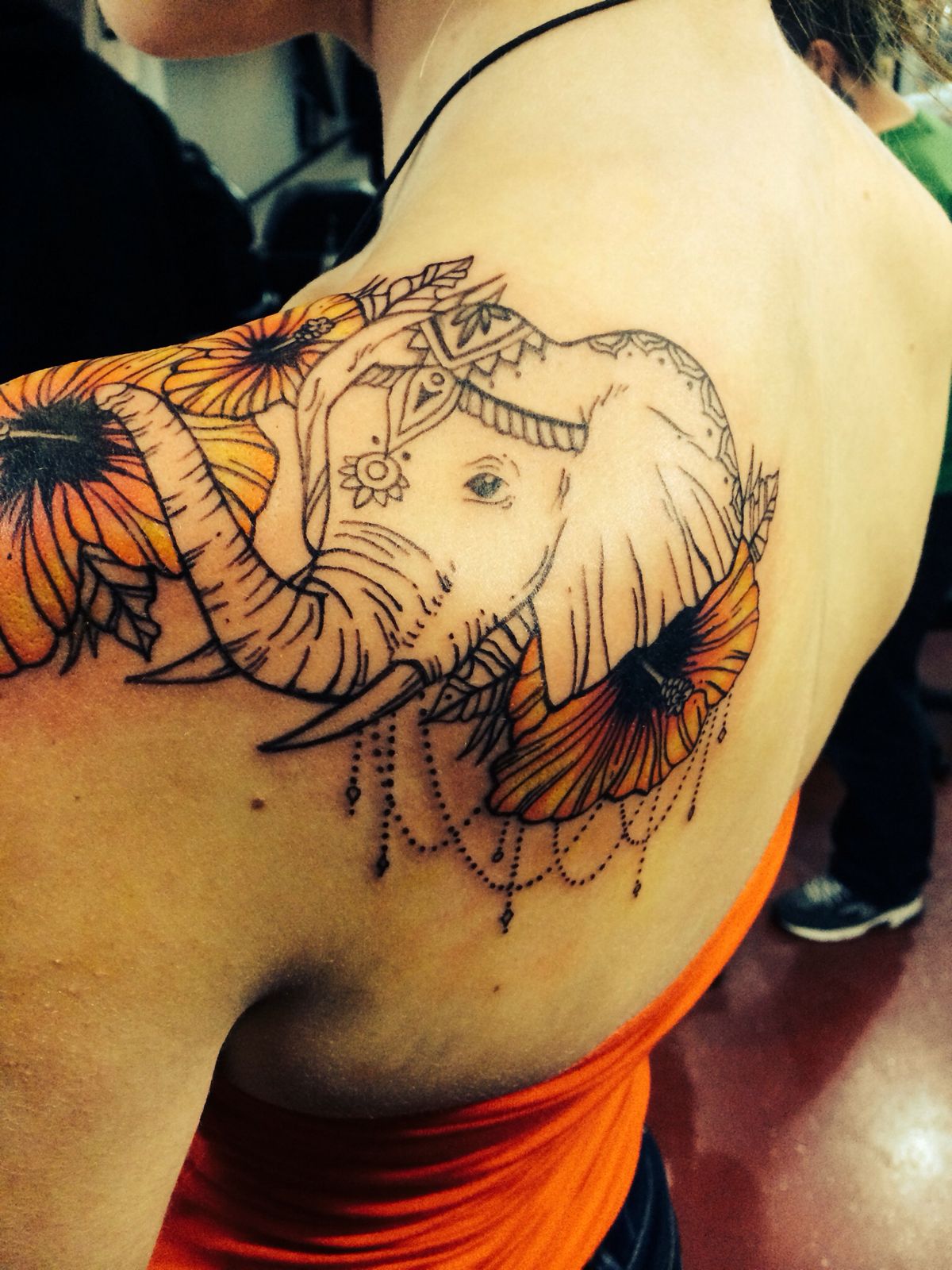Yellow Lily Flowers and Elephant Head Tattoo On Left Back Shoulder
