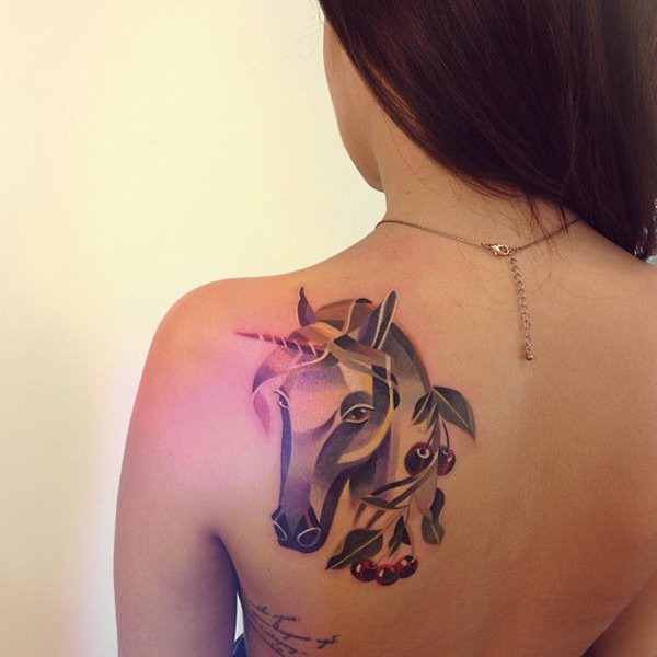 Abstract Unicorn Head Tattoo On Left Back Shoulder