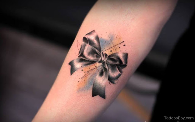 Amazing Grey And Black Bow Tattoo On Forearm
