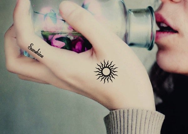 Amazing Sun Tattoo On Girl Left Hand