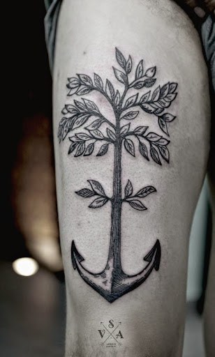 Anchor And Tree Tattoo On Thigh