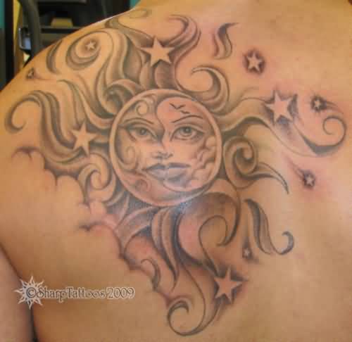 Awesome Stars And Sun Tattoo On Back Shoulder