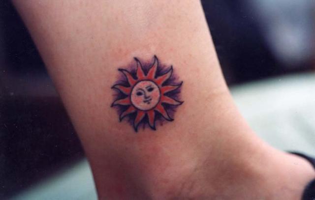 Awesome Sun Tattoo On Side Leg