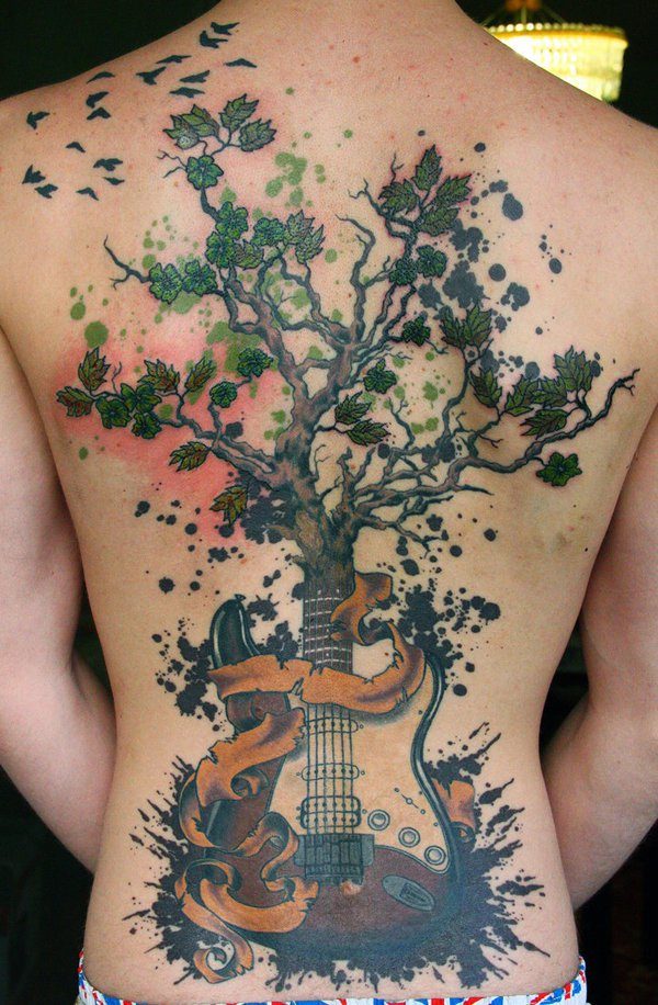 Banner With Guitar Tree Tattoo On Full Back