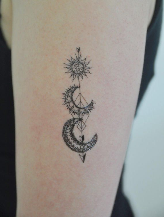 Beautiful Moon And Sun Tattoos On Girl Left Bicep