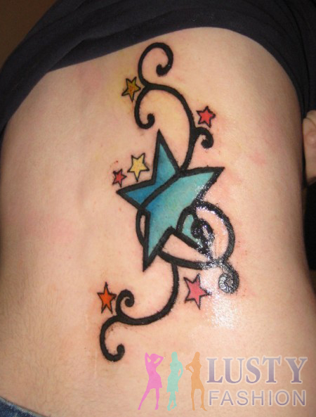 Beautiful Shooting Stars Tattoo On Girl Back