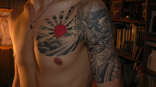 Black And Grey Mountains With Rising Sun Tattoo On Chest