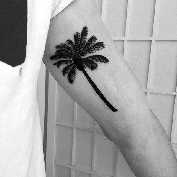 Black Ink Inner Bicep Palm Tree Tattoo
