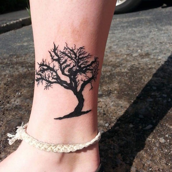 Black Ink Oak Tree Tattoo On Side Leg