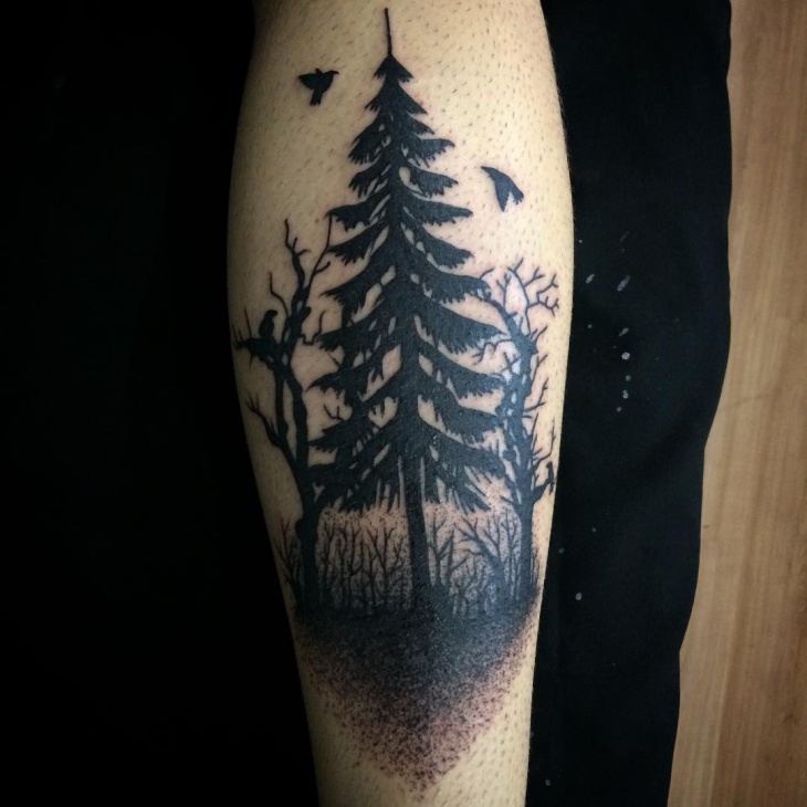 Black Ink Pine Tree Tattoo On Back Leg