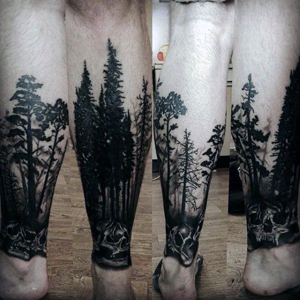 Black Ink Skulls And Tree Tattoos On Legs