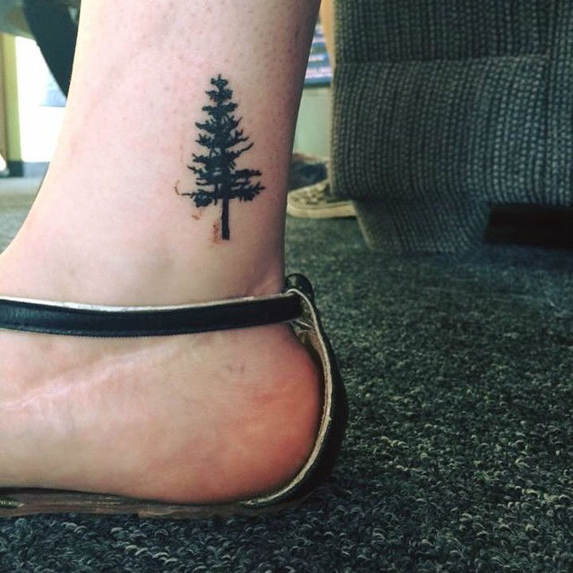 Black Ink Small Pine Tree Tattoo On Ankle