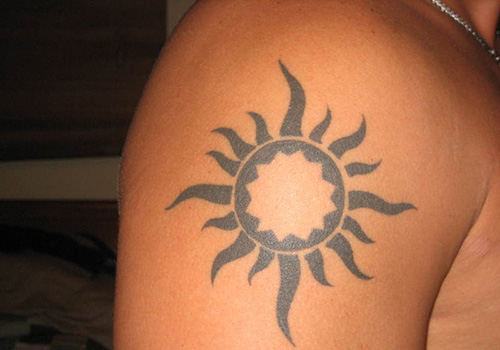 Black Tribal Rays and Simple Sun Tattoo On Shoulder