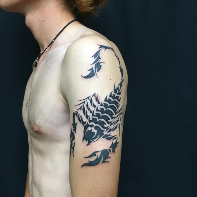 Black Tribal Scorpion Tattoo On Man Left Arm