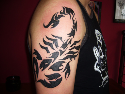 Black Tribal Scorpion Tattoo On Right Shoulder