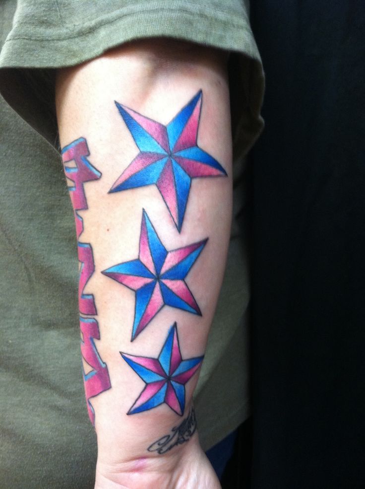 Blue And Pink Nautical Star Tattoos On Arm Sleeve