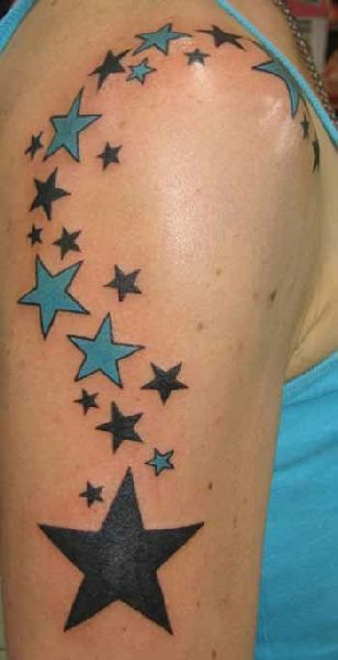 Blue And Shooting Stars Tattoo On Right Shoulder