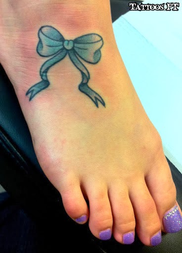 Blue Bow Tattoo On Girl Right Foot