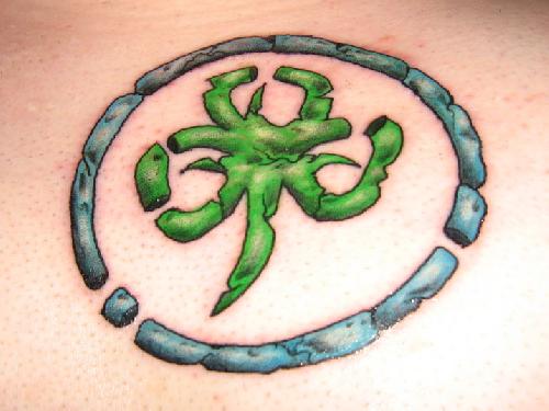 Blue Circle And Green Celtic Shamrock Tattoo Idea