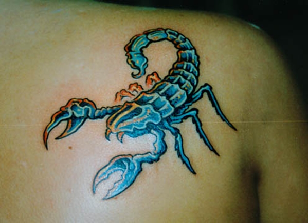 Blue Girly Scorpion Tattoo On Man Front Shoulder