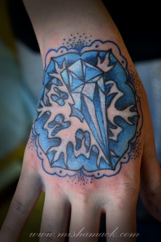 Blue Ink Snowflakes And Diamond Tattoo On Right Hand