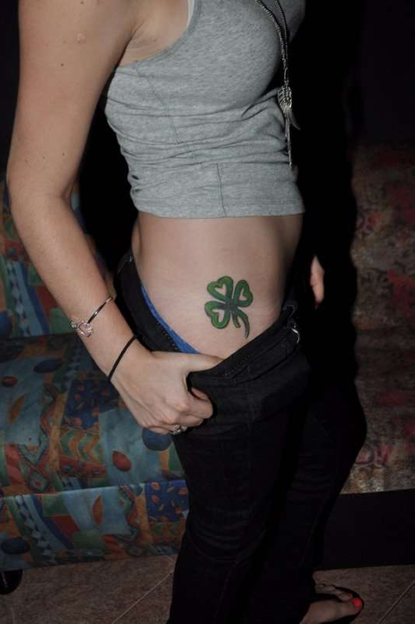 Celtic Shamrock Tattoo On Girl Side Leg