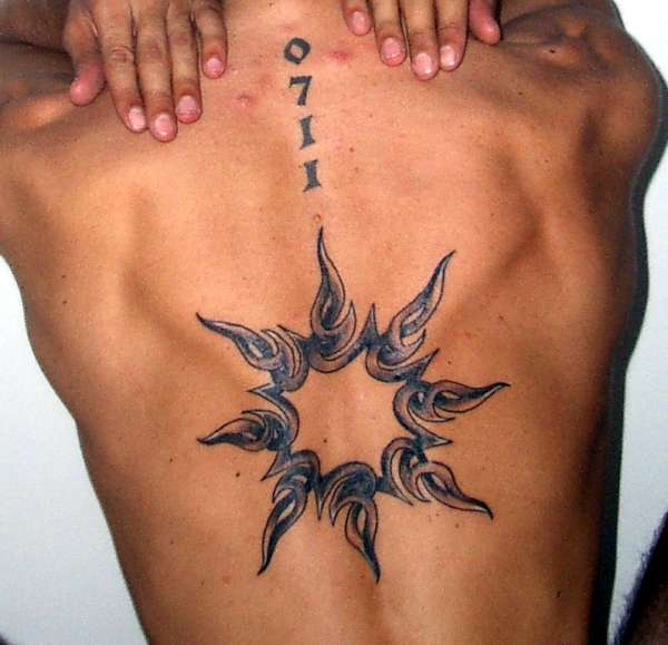 Celtic Sun Tattoo On Man Back Body