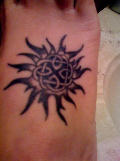 Celtic Sun Tattoo On Right Foot