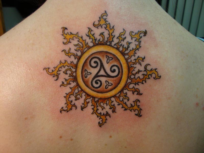 Celtic Sun Tattoo On Upper Back